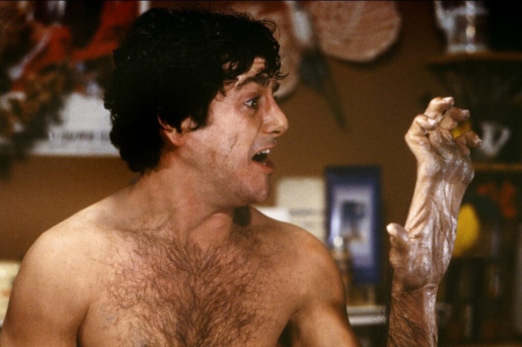 An American Werewolf in London — David Naughton freaking out about his transforming hand during the full moon.