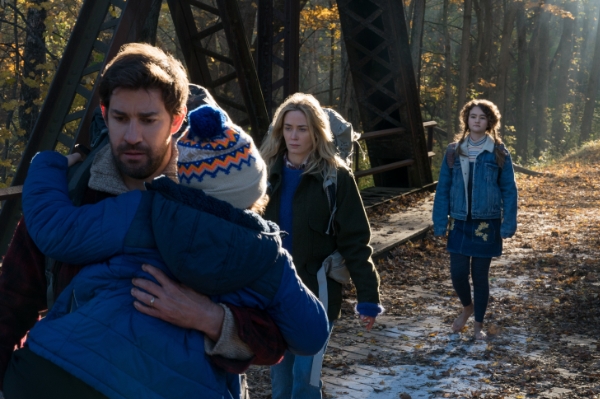 Family from A Quiet Place walking together outdoors