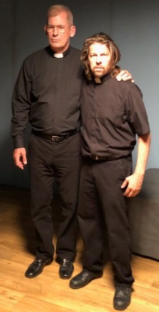 Peter Murnik (Father Dan) and Kyle Hester (Father Joshua) behind-the-scenes of Preacher Six, dressed as preachers. 