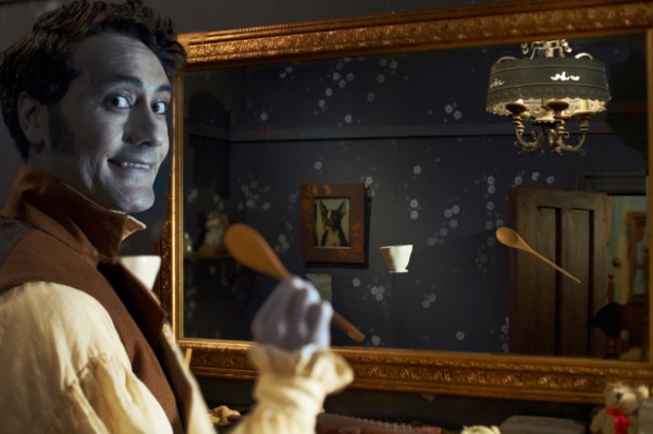 vampire goofing off in front of a mirror in What We Do in the Shadows